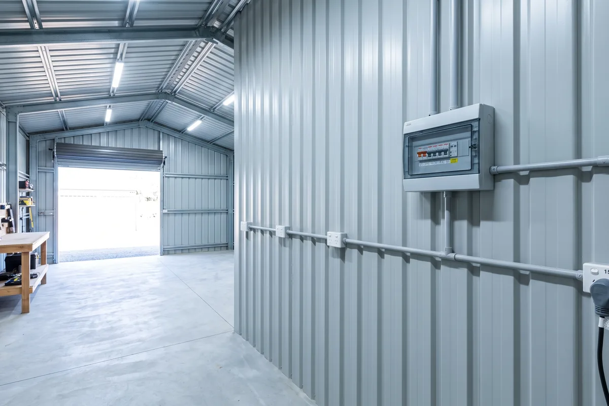 New shed workshop with fresh electrical fit-out and high-bay lighting